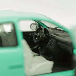Miniatura White Box - Opel Corsa B - 1/24 - Verde
